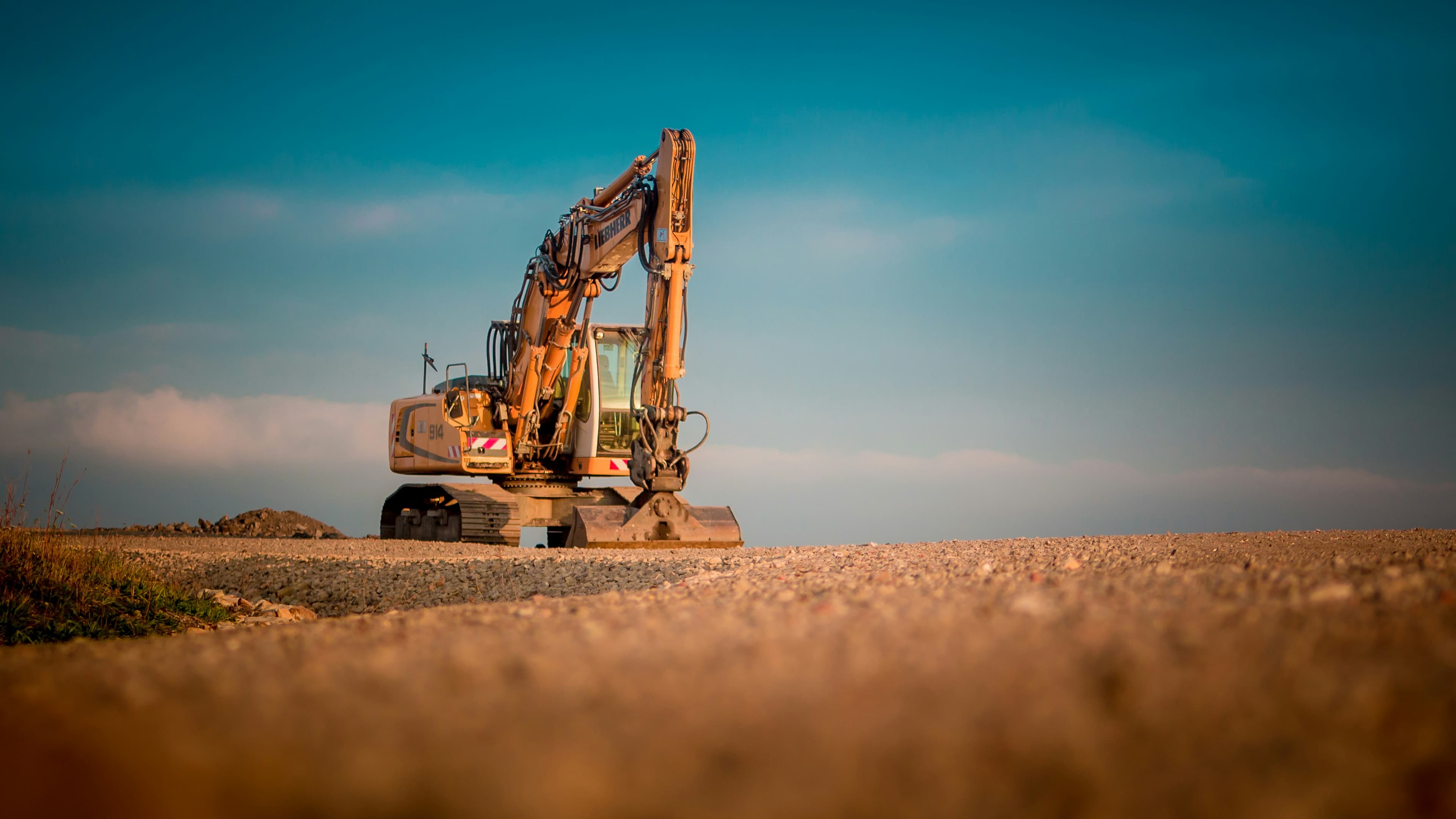 Excavator at a construction site in Telangana